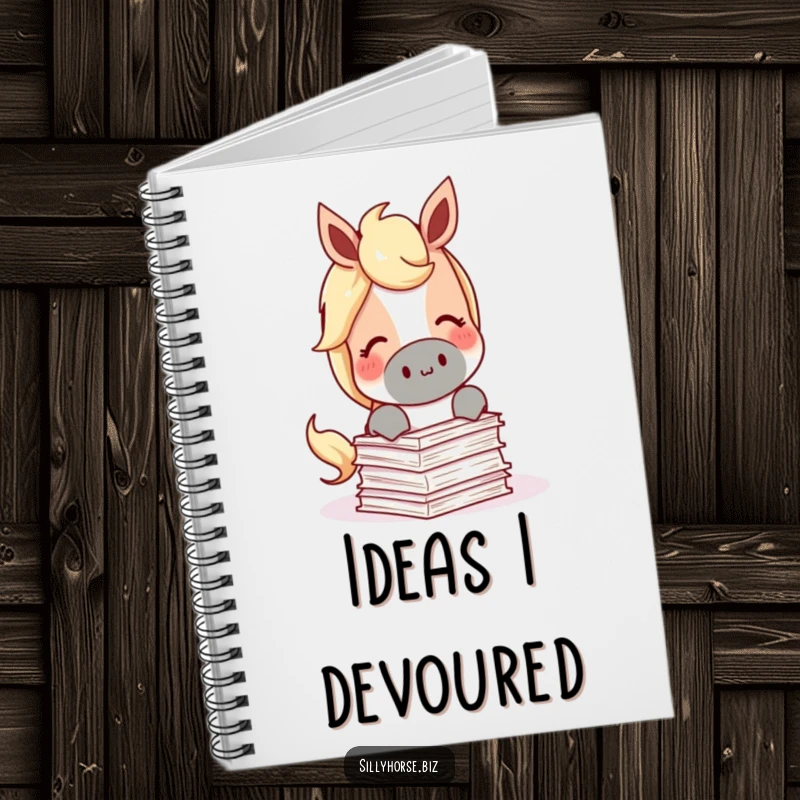 Funny Notebook showing a content horse happily munching on a miniature stack of papers, perfect for creative writing.